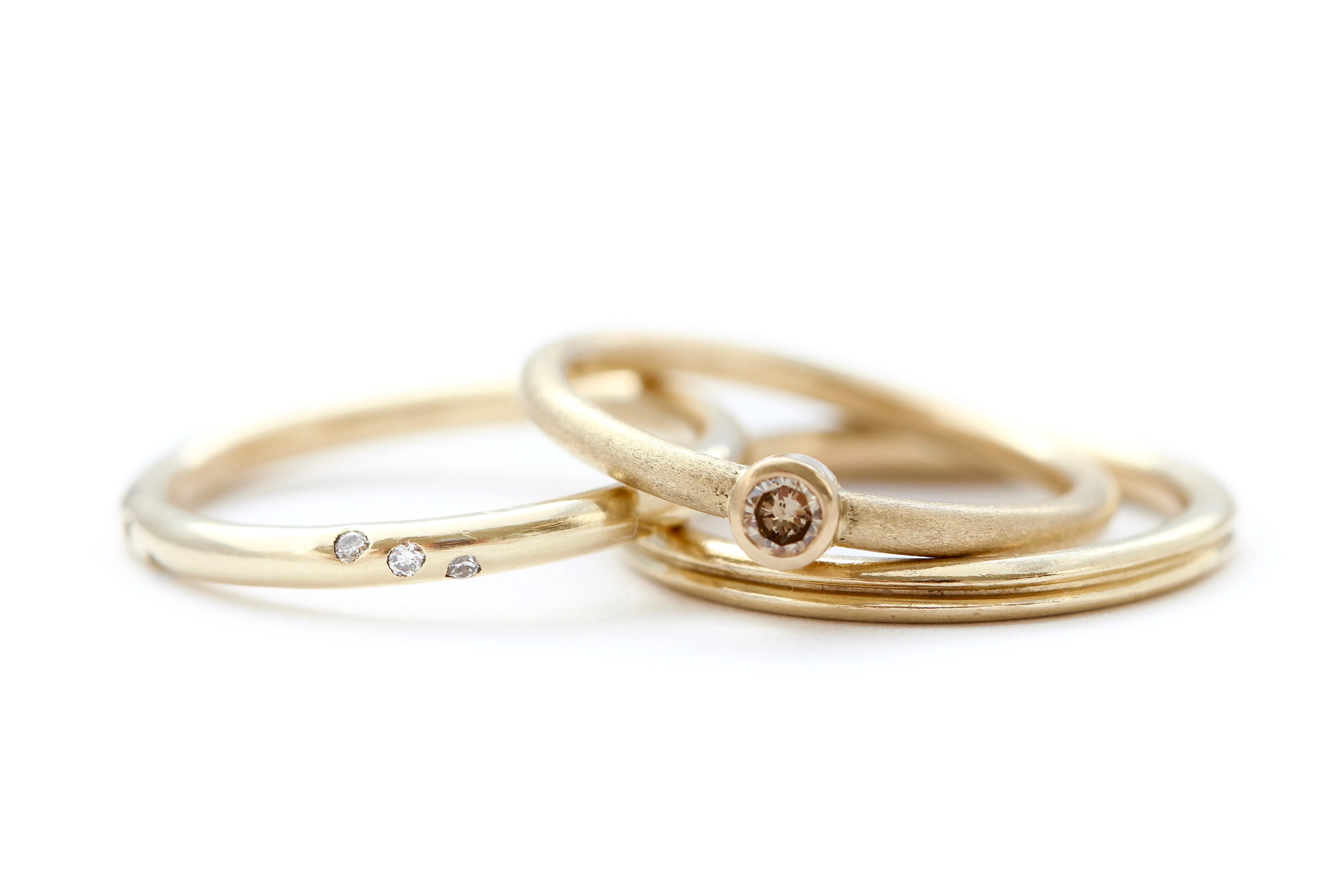 14k yellow gold ring with round white diamonds