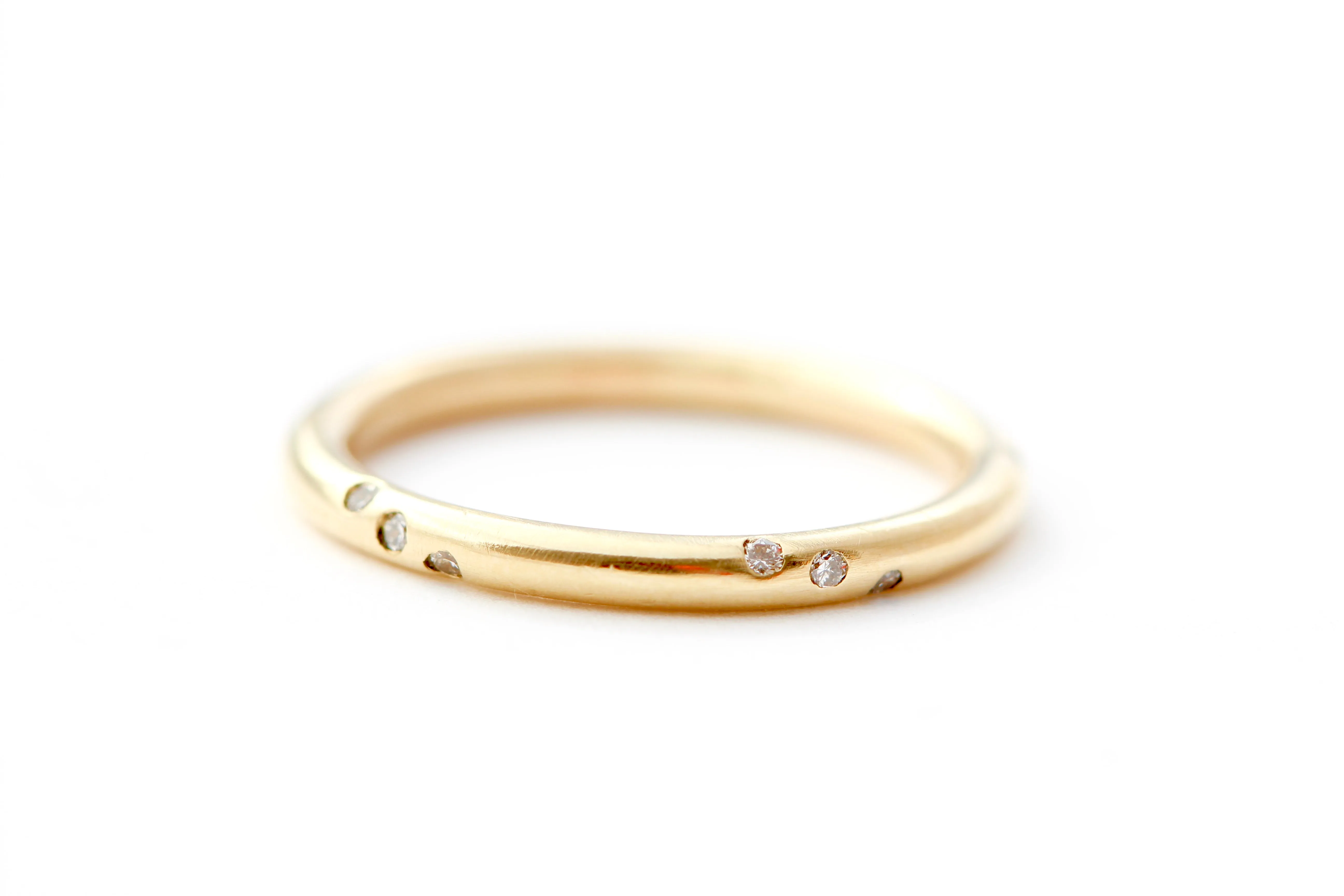 14k yellow gold ring with round white diamonds