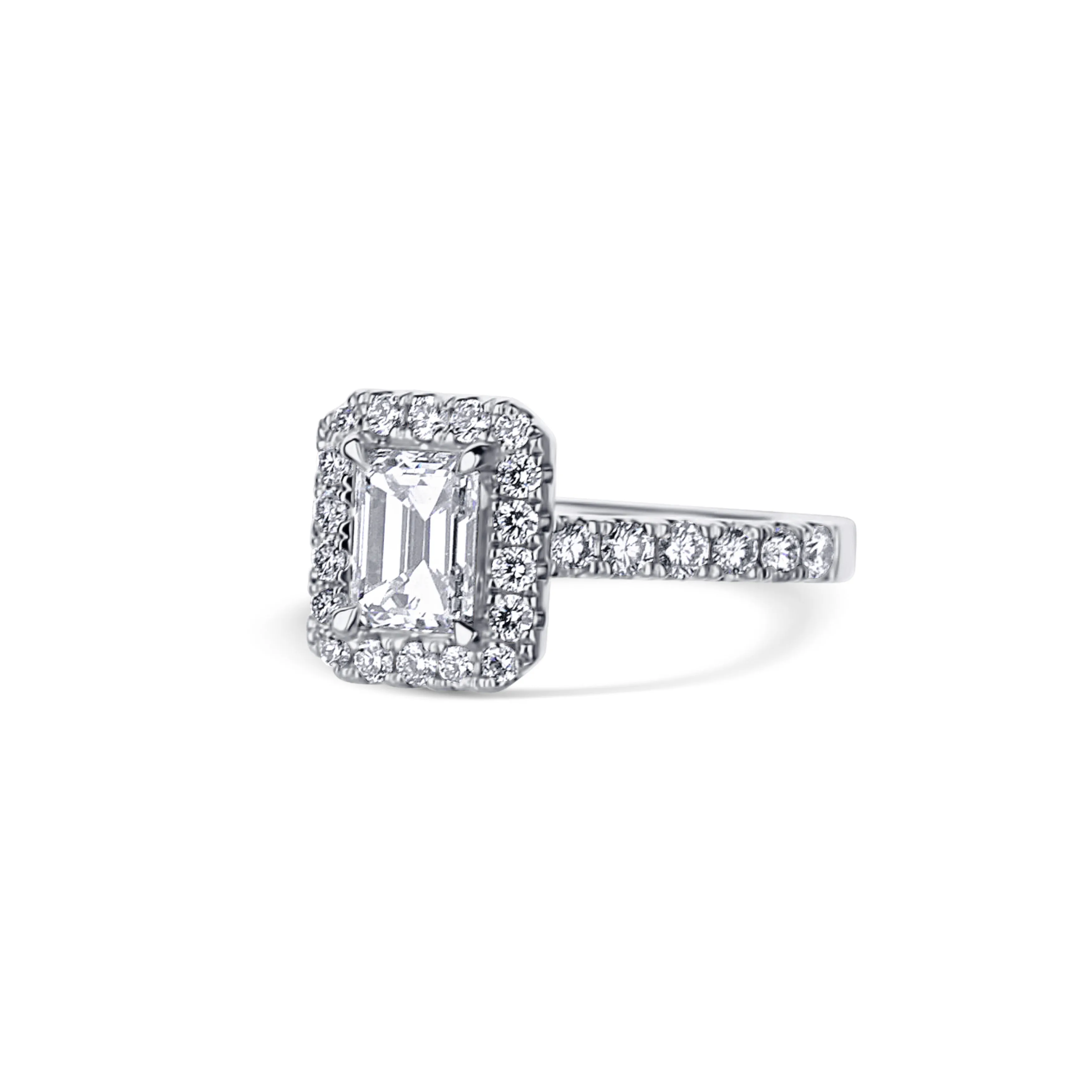 18K White Gold Ring With A 1.11 Carat Emerald Cut Diamond Center Stone And Round Diamonds