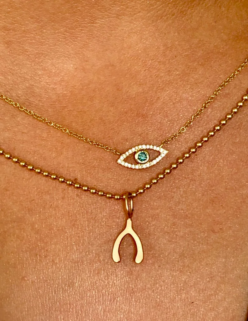 DIAMOND EVIL EYE NECKLACE WITH BEZEL SET SAPPHIRE