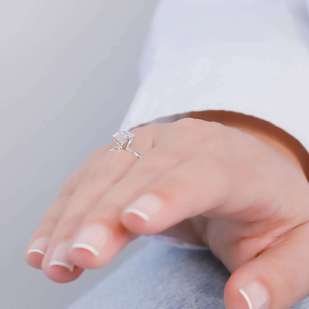 Firefly Glow twisted Shank Natural Round Cut Diamond Engagement Ring