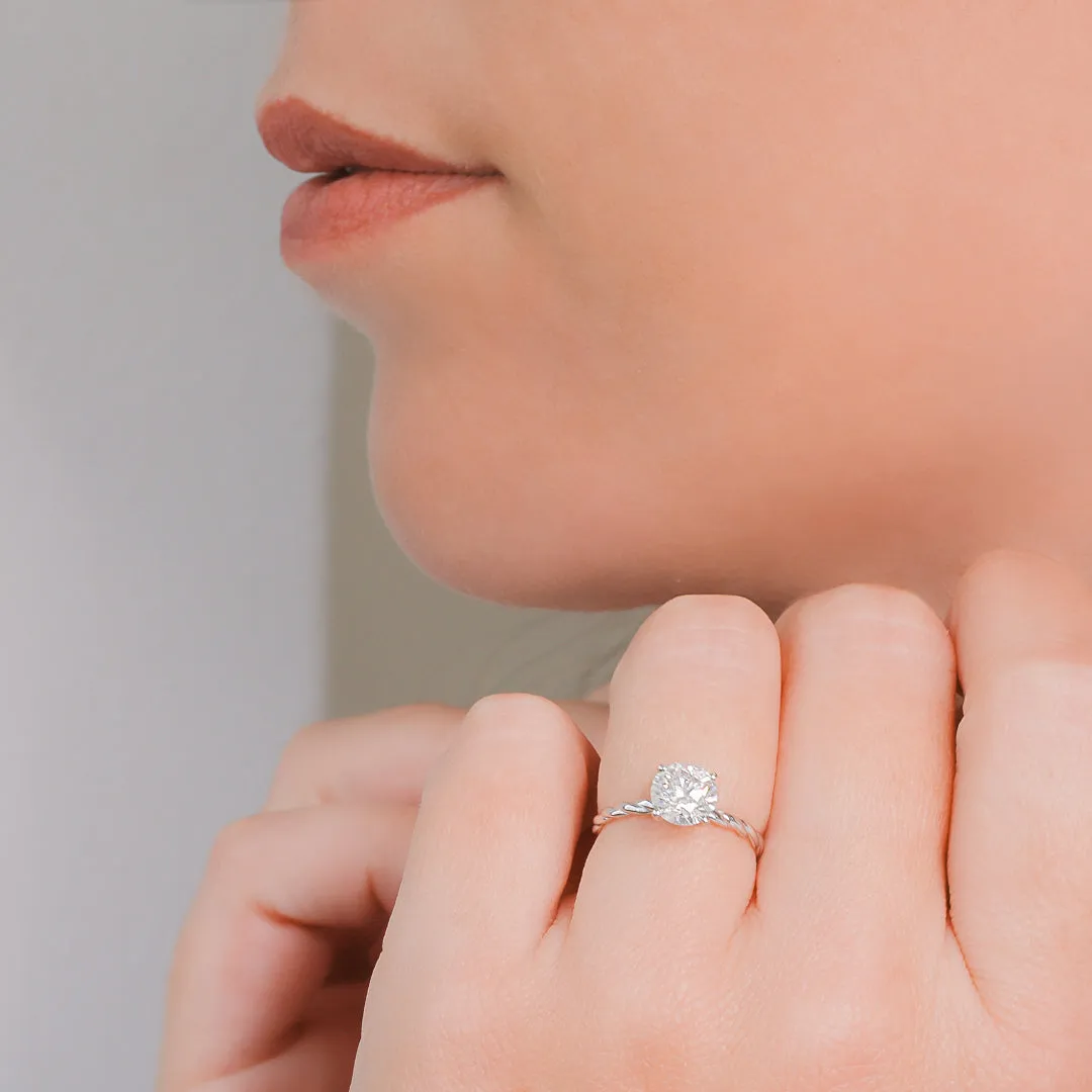 Firefly Glow twisted Shank Natural Round Cut Diamond Engagement Ring