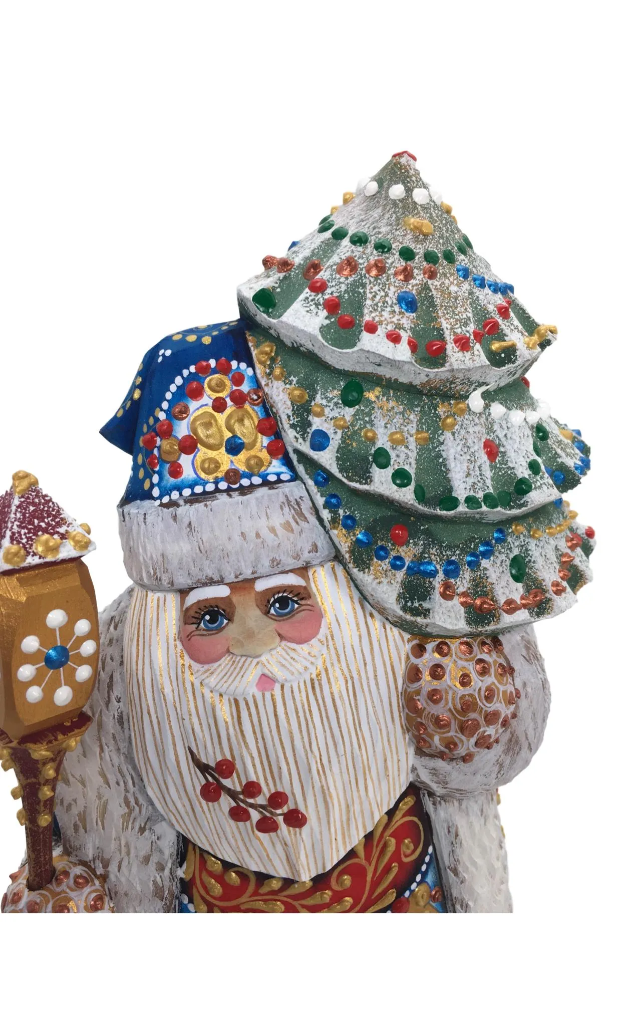 Luxurious dressed Santa with Christmas tree