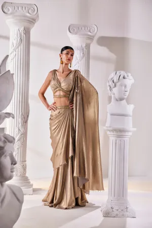 Mettalic Antique Gold Drape Saree With An Embellished Belt. It Is Paired With A Luxurious Metallic Blouse.