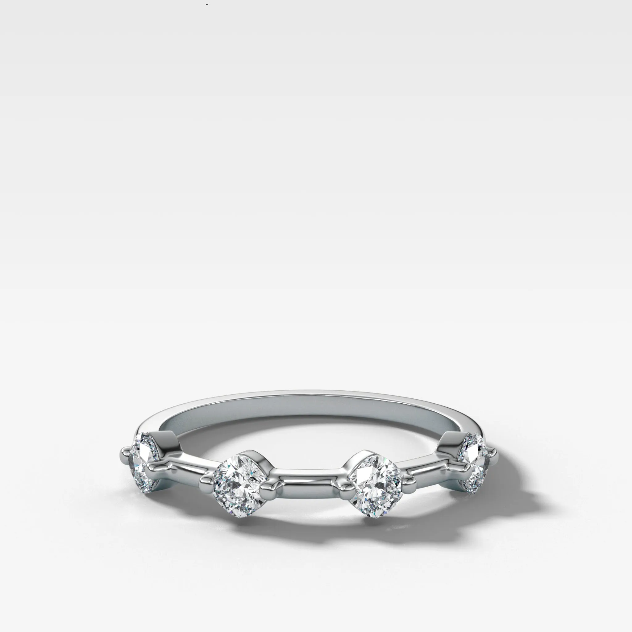 Spaced Compass Wedding Band with Four Cushion Cuts