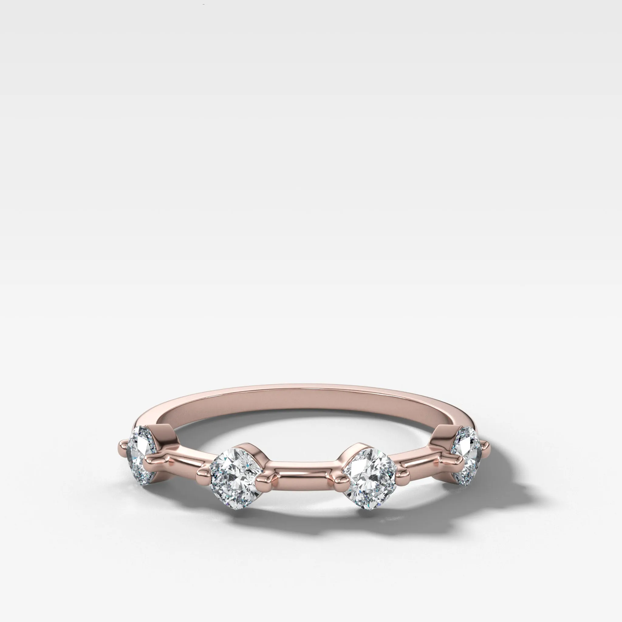 Spaced Compass Wedding Band with Four Cushion Cuts