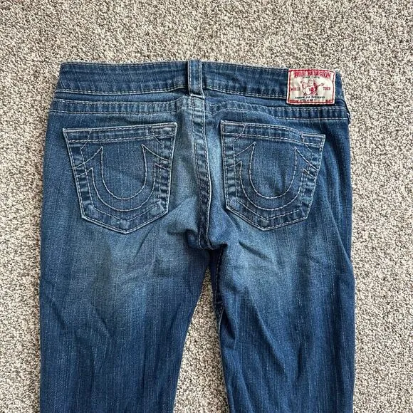 True Religion medium wash distressed skinny low-rise jeans size 27